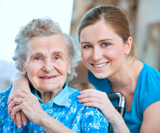 photo of a senior woman with her caregiver